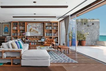 Por que se hospedar em um apartamento na praia?