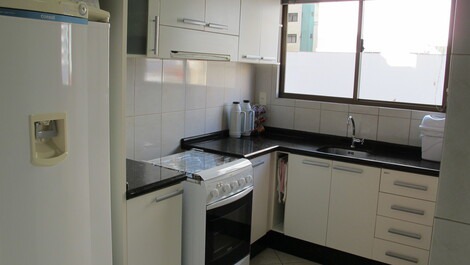 A bedroom Meia Praia Itapema SC