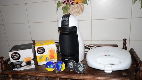 Sirva-se de café expresso ou chá gelado na cozinha ampla, completa, compartilhada e com torradeira d