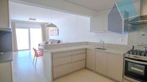 Cozinha integrada com sala de jantar e estar