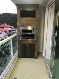 Churrasqueira gourmet na varanda da sala