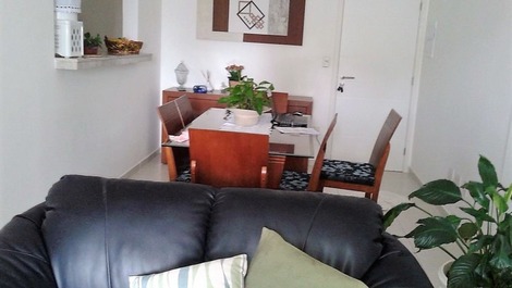 Apartment in Bertioga, Indaiá standing on the sand, overlooking the sea