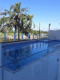 Apartment in Bertioga, Indaiá standing on the sand, overlooking the sea