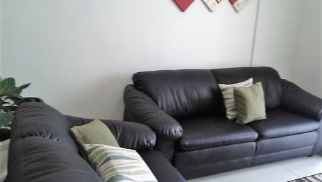 Apartment in Bertioga, Indaiá standing on the sand, overlooking the sea