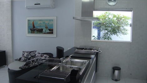 Cozinha integrada com as salas