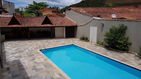 Casa com ar condicionado, piscina e Wi-Fi-Caraguatatuba