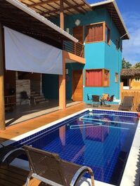 Casas com ar, piscina e área gourmet de frente pra Mucuge 8 Pessoas