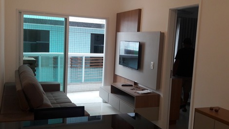 Apartamento en Praia do Forte, piscina, aire acondicionado.