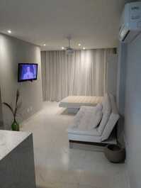 sala com a cama aberta