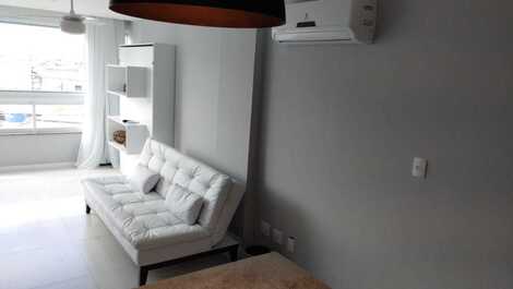 sala com a cama fechada