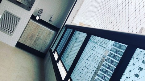 Sacada com janela de vidro