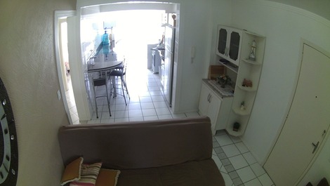 vista da sala para cozinha