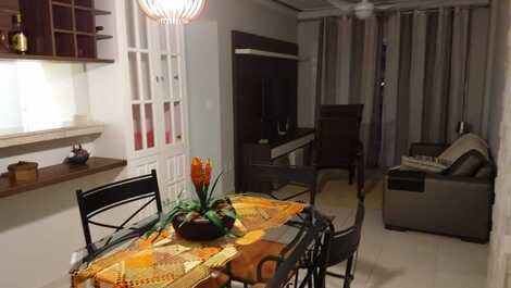 Sala de jantar com a sala de Tv 