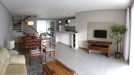 Copa integrada com sala de estar, cozinha e varandas