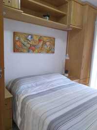 Suíte com cama de casal e Ar condicionado