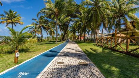 CASA DE LUXO EM FRENTE A PRAIA "PE NA AREIA" em Guarajuba -BA