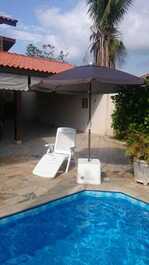 Casa para alugar temporada, com piscina, área de lazer e suíte