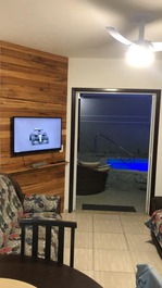 Vista da sala para piscina.