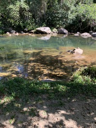 Prainha em frente a casa
