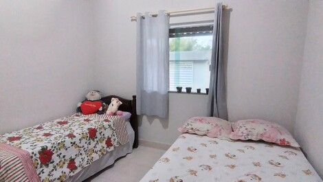 Quarto com ventilador de teto