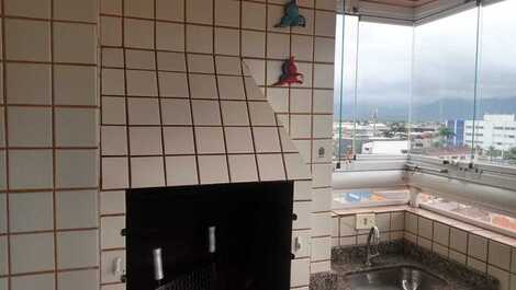 Apartamento vacacional en Praia Grande con piscina y barbacoa