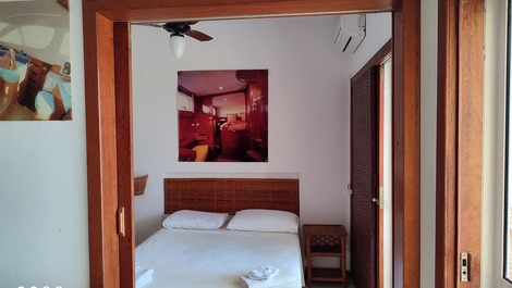 Suite do apartamento térreo vista mar 