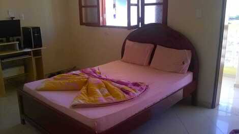 Quarto 1 com acesso a varanda