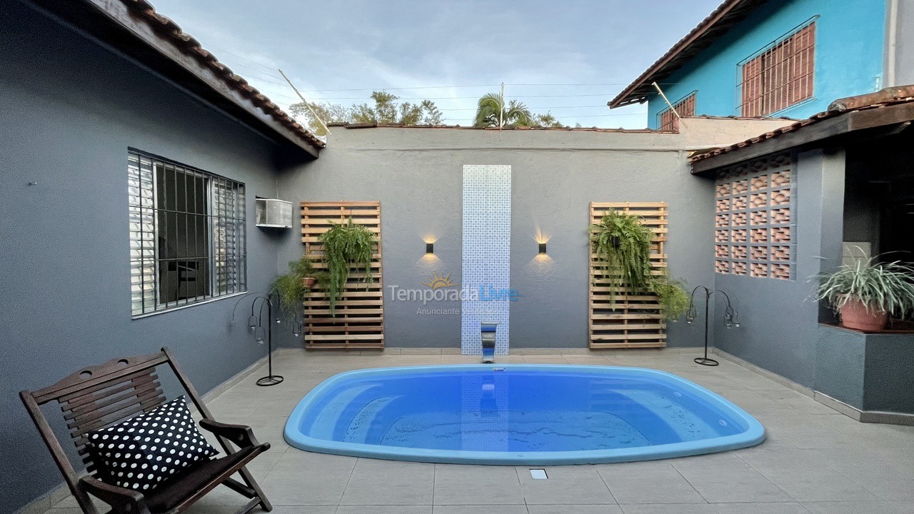 Casa para alquiler de vacaciones em Bertioga (Jardim Indaiá)