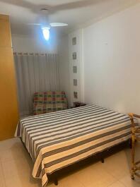 Quarto casal com sofá cama 