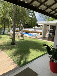 Linda casa a 50m do mar cond fechado 4 suites piscina,espaco gourmet