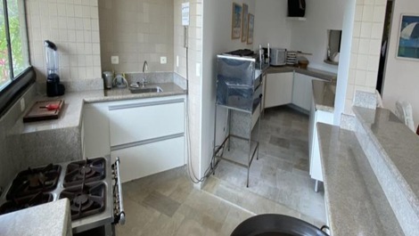 Apartamento em Riviera pé na areia com vista para o mar