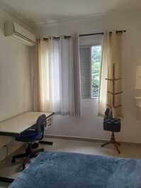 Quarto com vista para natureza