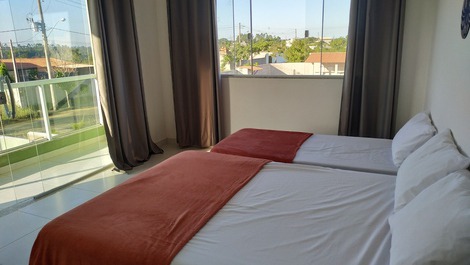 Quarto com varanda 