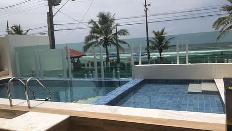 Apartment with gourmet balcony, facing the sea in Mongaguá/Sp