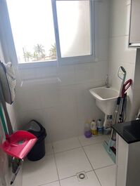 Apartment with gourmet balcony, facing the sea in Mongaguá/Sp