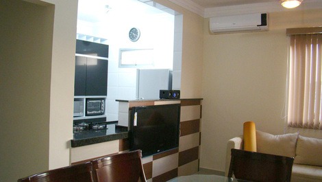 Flat 2 bedrooms. Pitangueiras, Guarujá with Pool, Air, Sea View, Wi-Fi