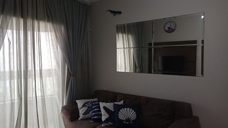 Ocean front building with barbecue on the balcony