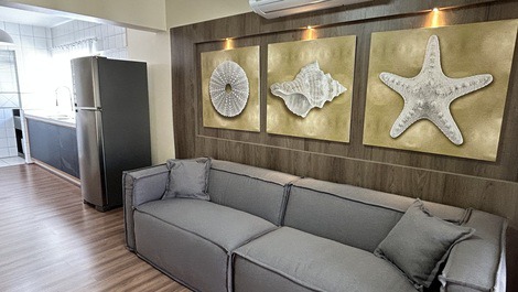 Sala conjugada com cozinha com ar