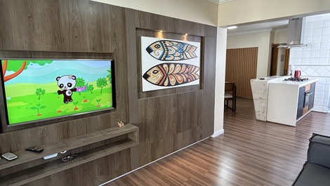 Sala conjugada com cozinha com ar