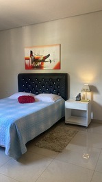 Suíte grande com ar condicionado