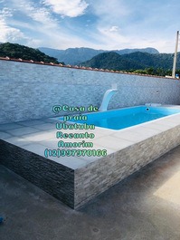 Casa com piscina**Aconchegante e confortável-5min de carro até a praia