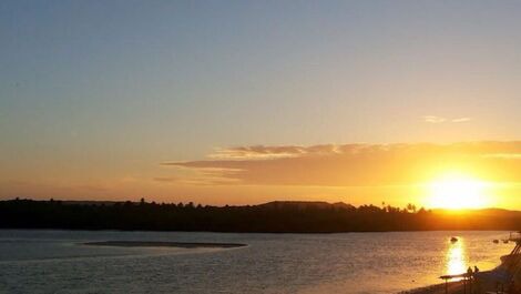 Por do sol visto da varanda da casa