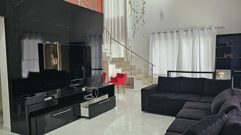 Sala de visita com tv