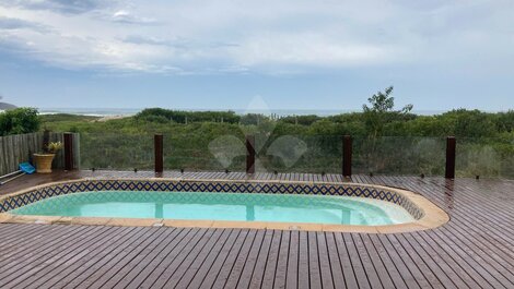 Casa p/ até 20 pessoas com 6 suítes a beira mar na Praia da Ferrugem