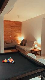 Terraza de casa de playa con mesa de billar con vista al mar - Itapoá SC