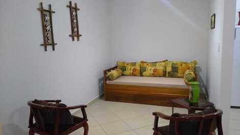 Sala de tv com sofá cama com 2 colchões 