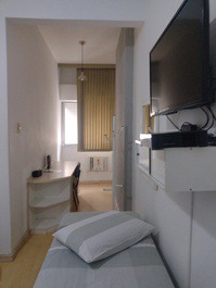 Quarto 2 com cama de casal e uma de solteiro