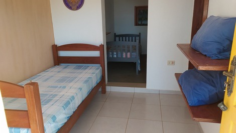 Quarto com uma cama solteiro