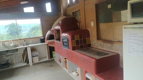 Cozinha, com forno pizza, forno, fogão de lenha, uso comum