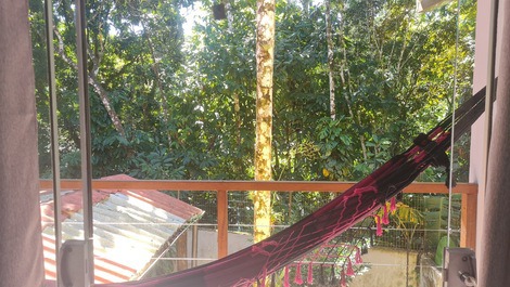 Varanda com rede chalé querubim 